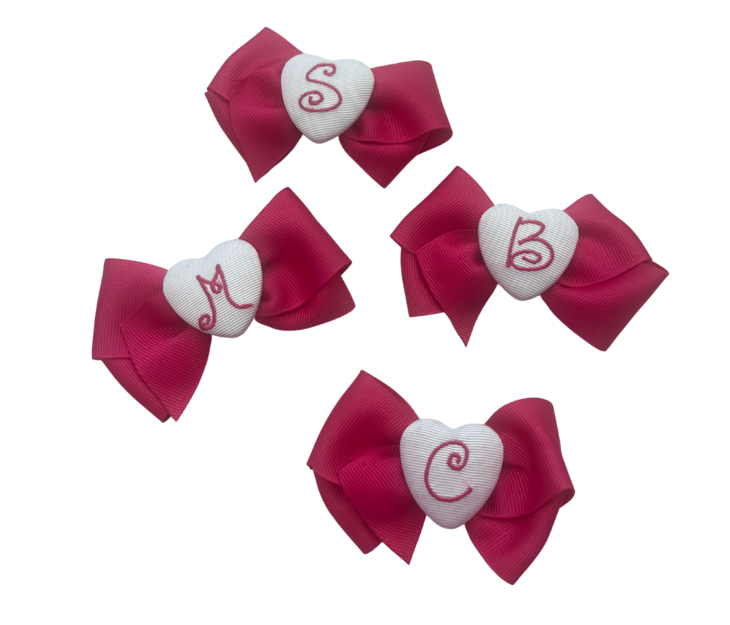 Mini pink initial bow